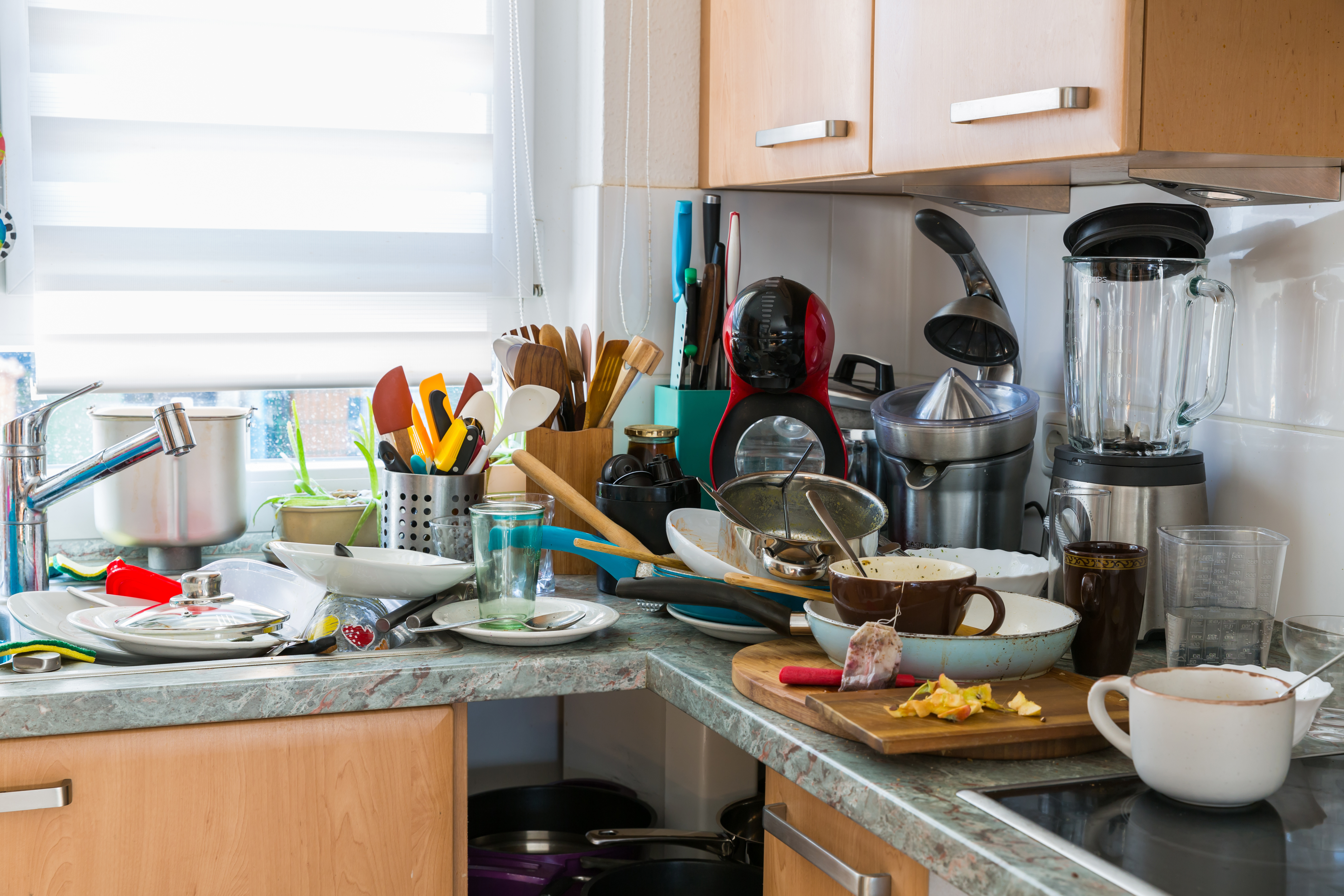 blog image of messy kitchen; Organize Your Apartment Kitchen!